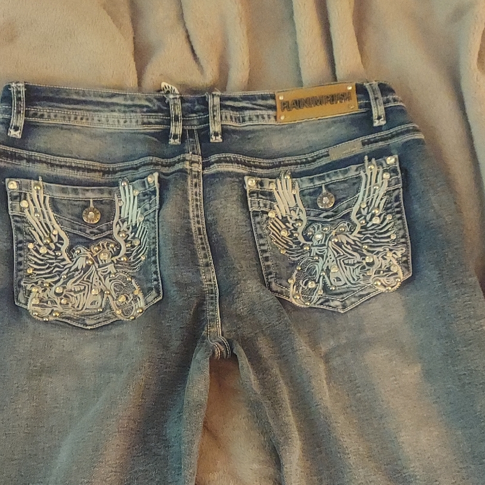 Handcrafted Blue Boot Cut Jeans with Embellished Pockets